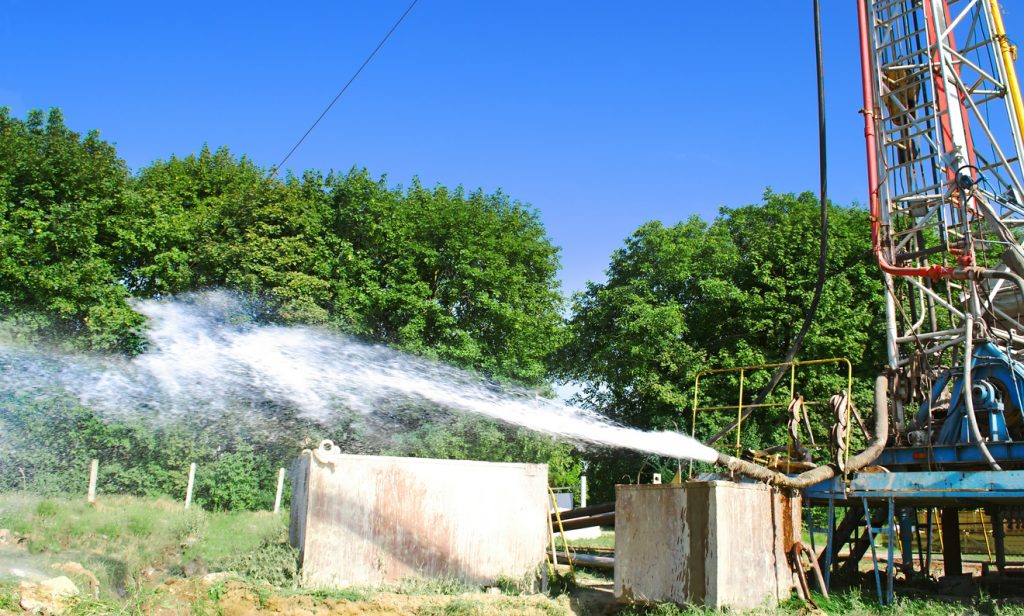 water spraying from pipes